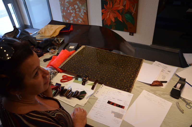 Marie-Christine Davidian reviewing cellulose acetate swatches, notes and prototypes
